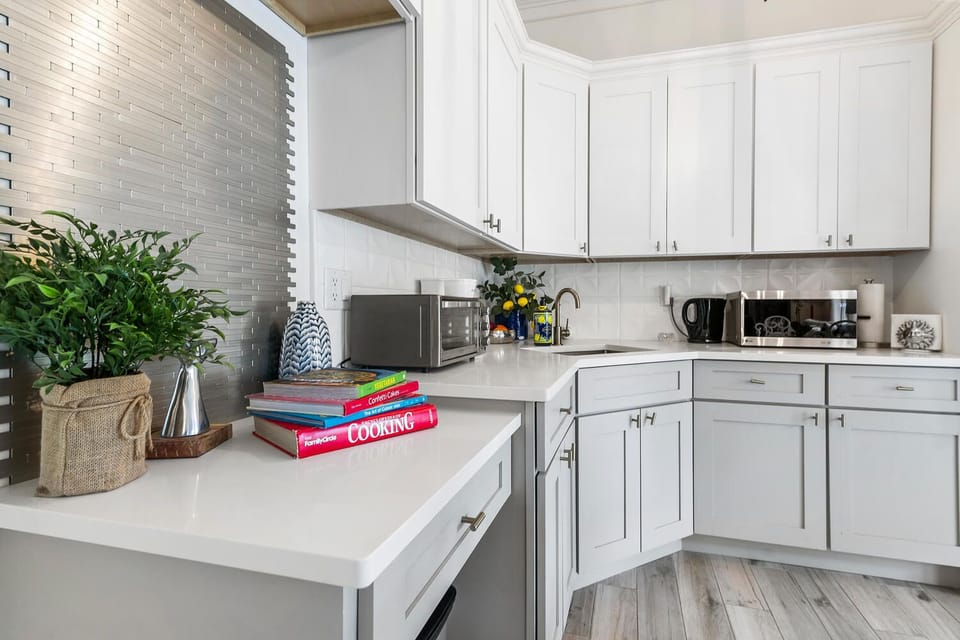  Fully equipped kitchen with top-of-the-line appliances and features. 
