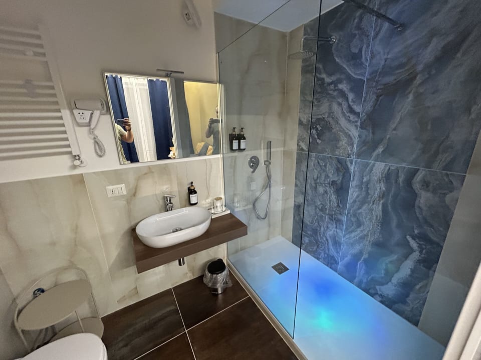 Family Suite | Bathroom | Hair dryer, bidet, towels, soap