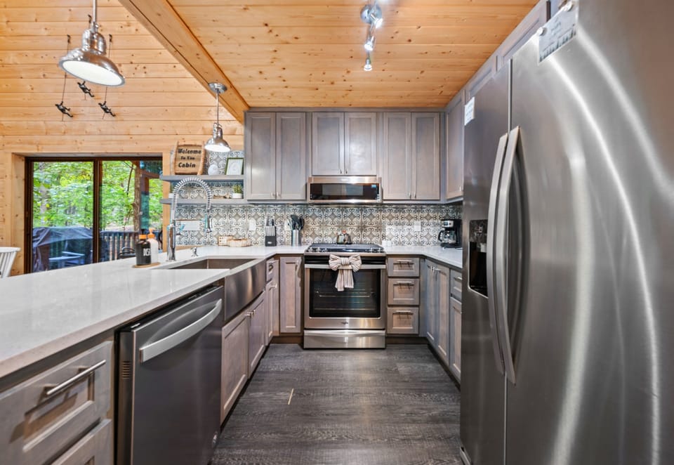 Stainless steel appliances and generous counter space make this kitchen both functional and easy to use.