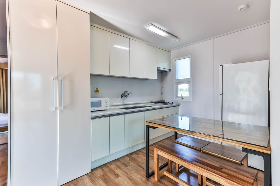 Family Room | Private kitchen | Fridge, electric kettle