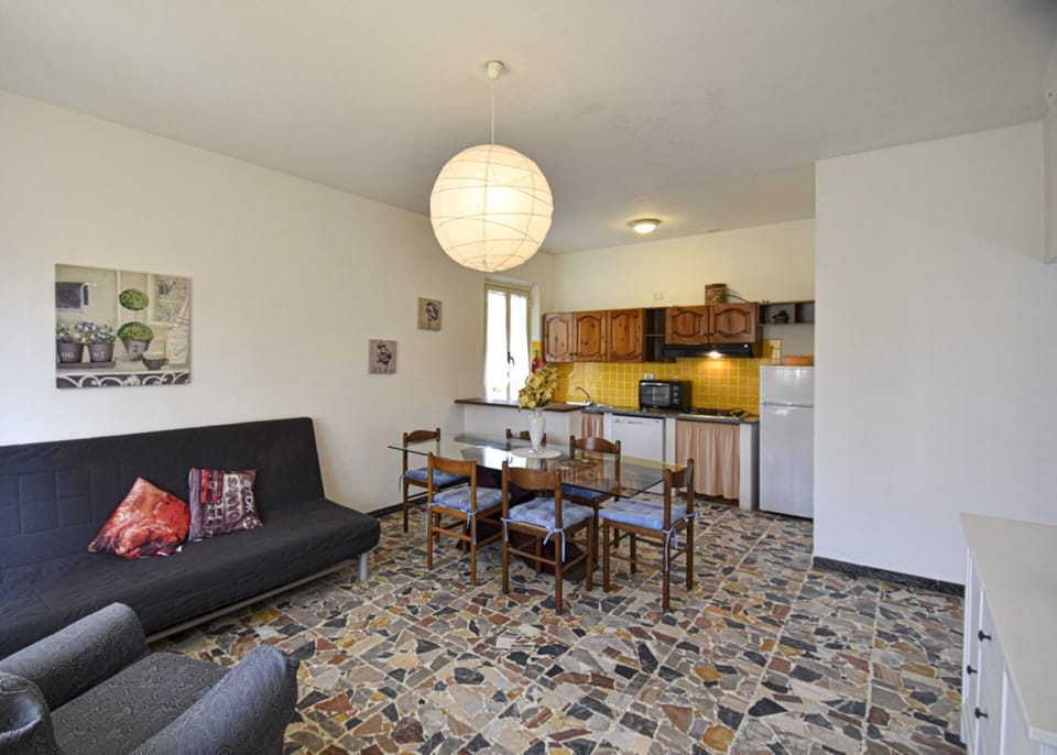 Living room with table-Ginestra 1-Elba Island