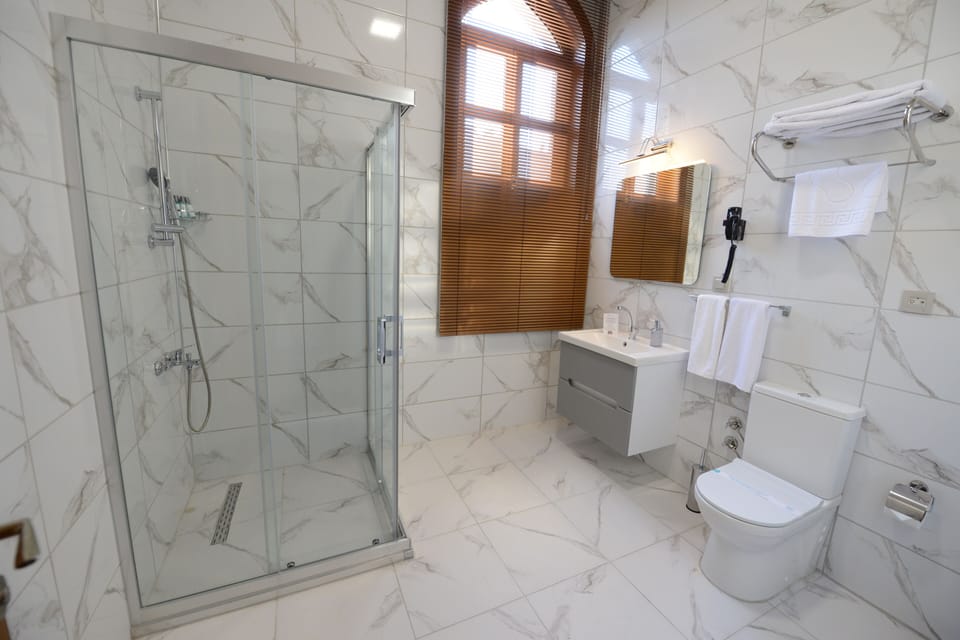 Standard Room, Multiple Beds, Non Smoking, Mountain View | Bathroom | Shower, rainfall showerhead, hair dryer, slippers