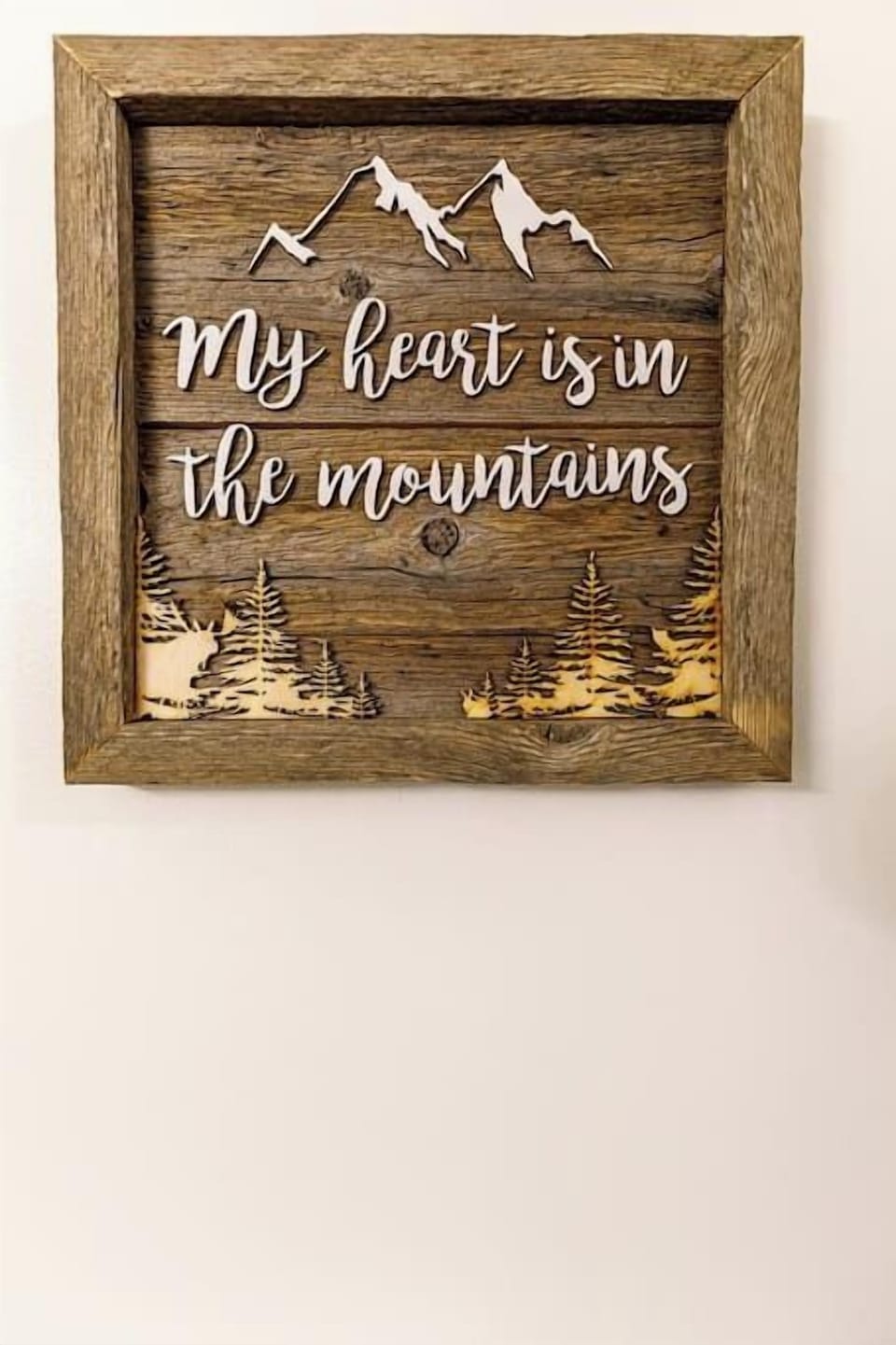 A beautiful art piece adds character to the main bathroom.