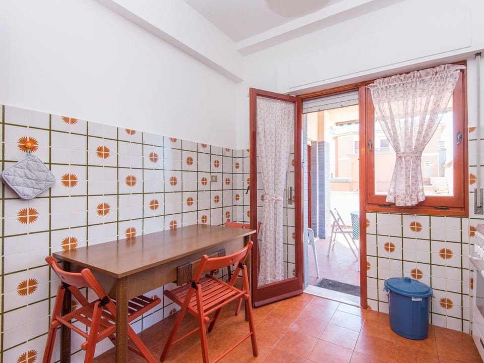 Furniture, Table, Property, Building, Cabinetry, Window, Door, Wood, Orange, Interior Design
