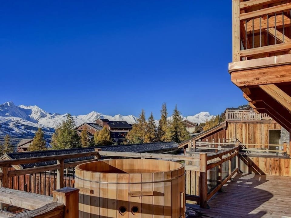 Balcony with hot tub and views to Mont Blanc and across the Tarentaise Valley