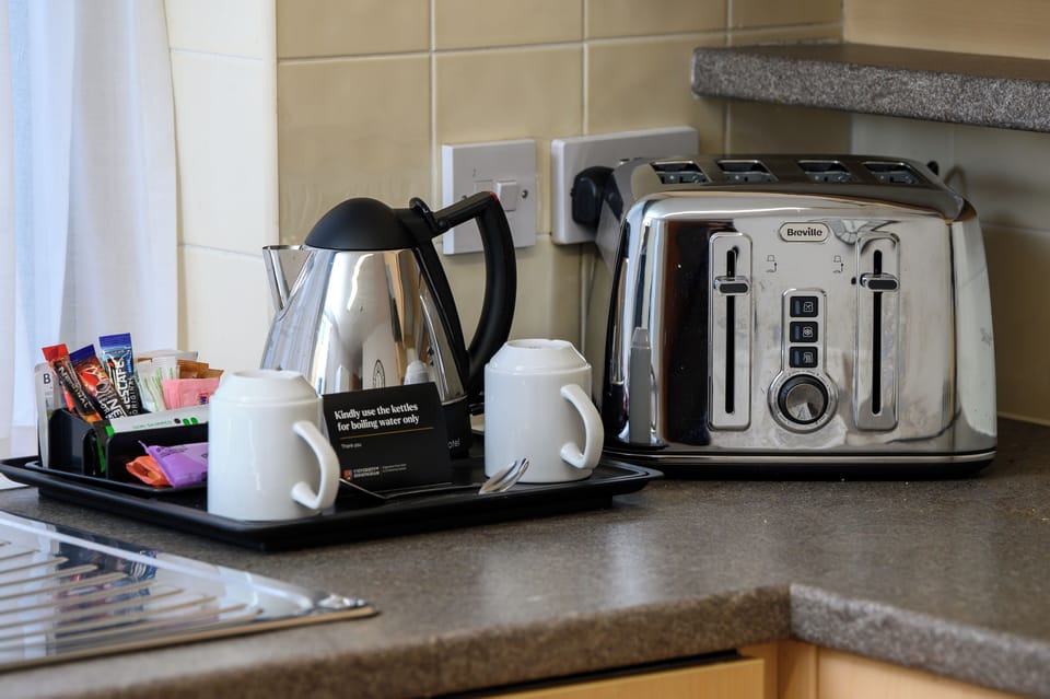 Standard Apartment | Private kitchen | Coffee/tea maker, electric kettle
