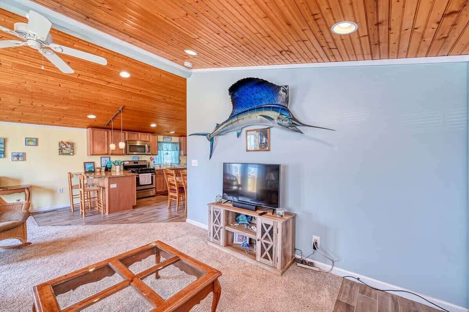 Open Floor Plan with Vaulted Beadboard Ceiling