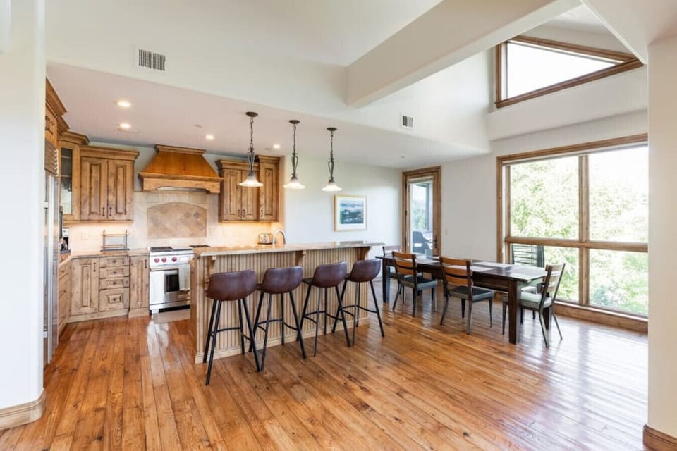 Fully stocked kitchen with seating for 12
