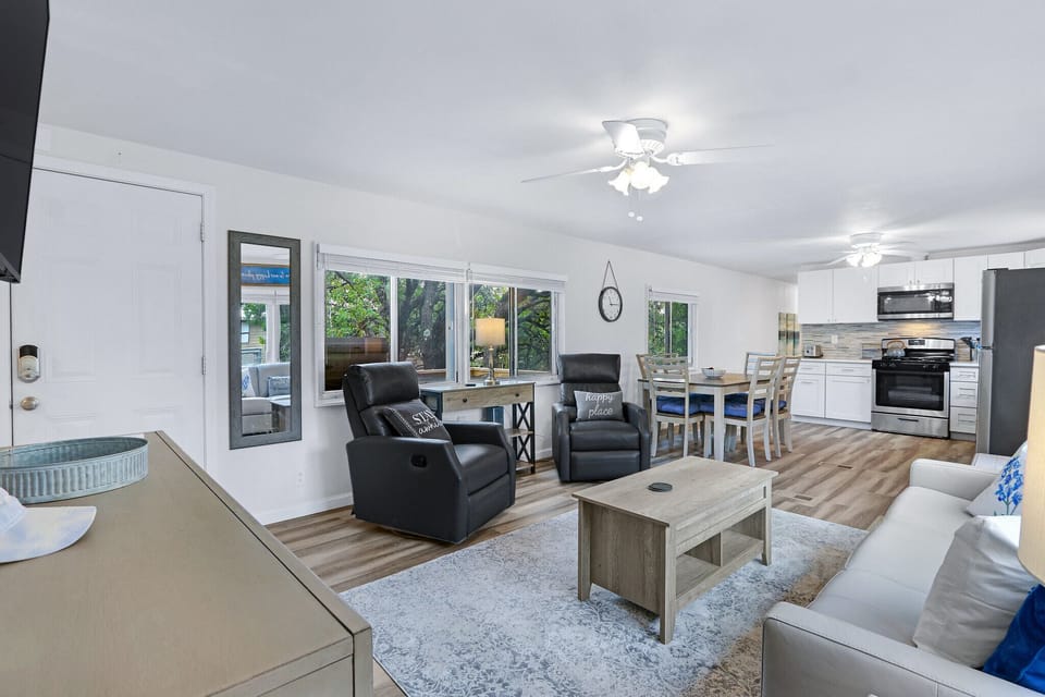 The dining space is behind the living room
