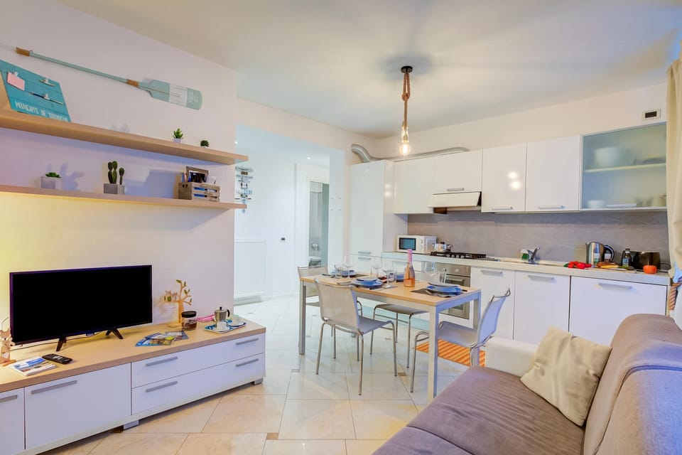 Family Apartment, 1 Bedroom, Microwave (Heart Of Riva - 100m From The Lake) | Living area | Flat-screen TV