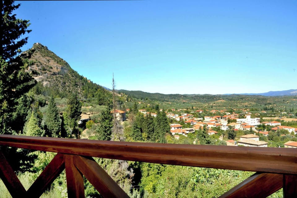 Balcony View – Overlooks the valley and lush countryside for tranquil mornings.