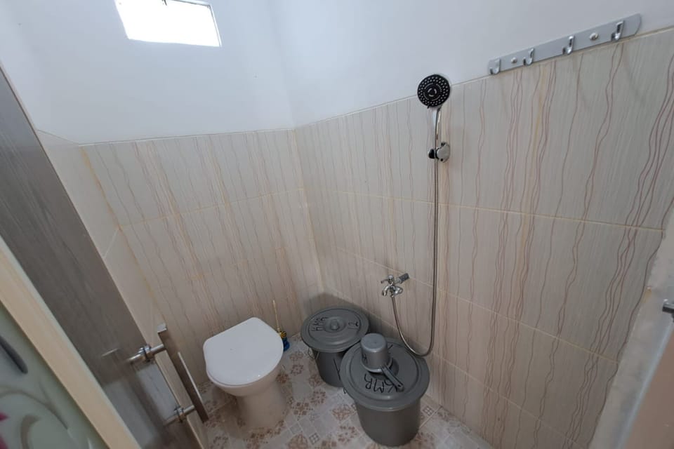 Standard Double Room | Bathroom | Shower, towels, soap