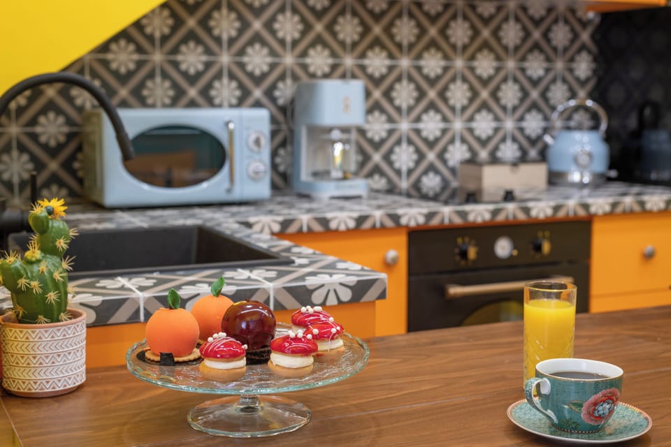 Design Apartment | Private kitchen | Full-size fridge, microwave, oven, stovetop
