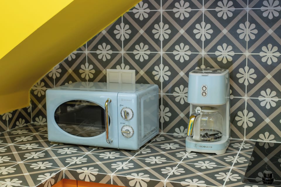 Design Apartment | Private kitchen | Full-size fridge, microwave, oven, stovetop