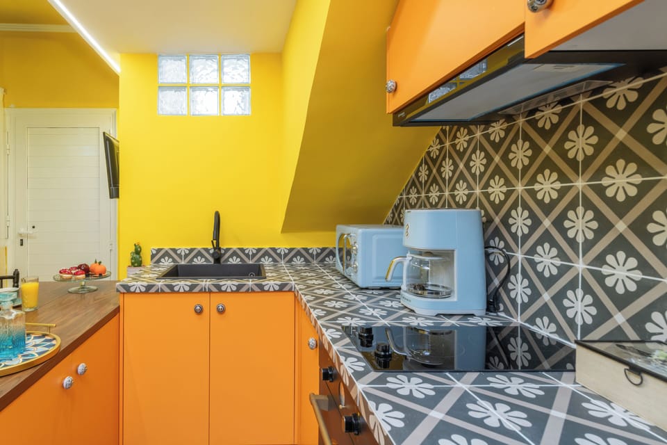 Design Apartment | Private kitchen | Full-size fridge, microwave, oven, stovetop