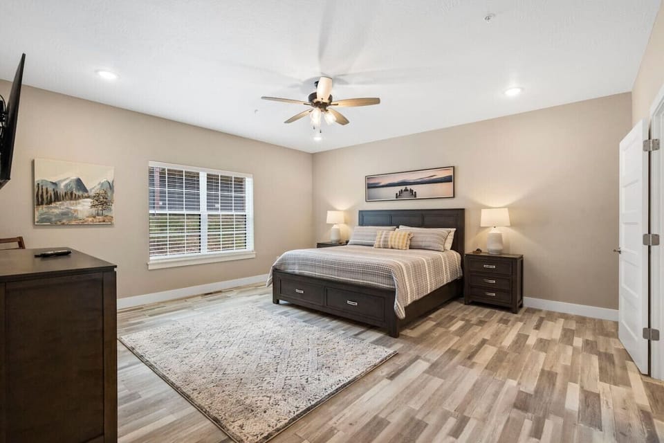 Bedroom 1: Large Primary Bedroom on main level with King bed and En Suite.  Located right off the kitchen and dining room.