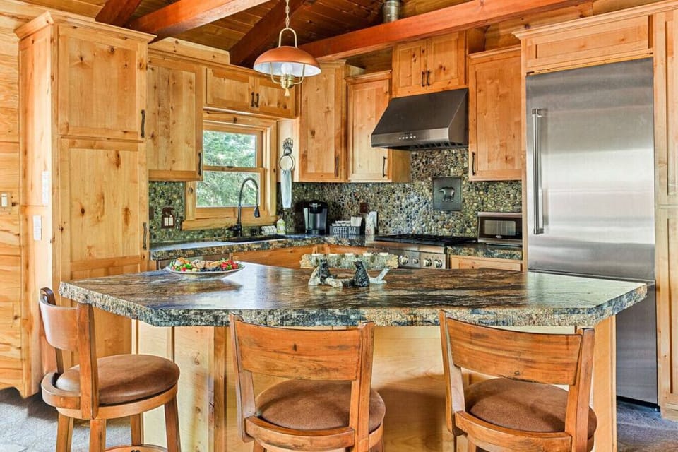 Bar seating for three at the kitchen island.
