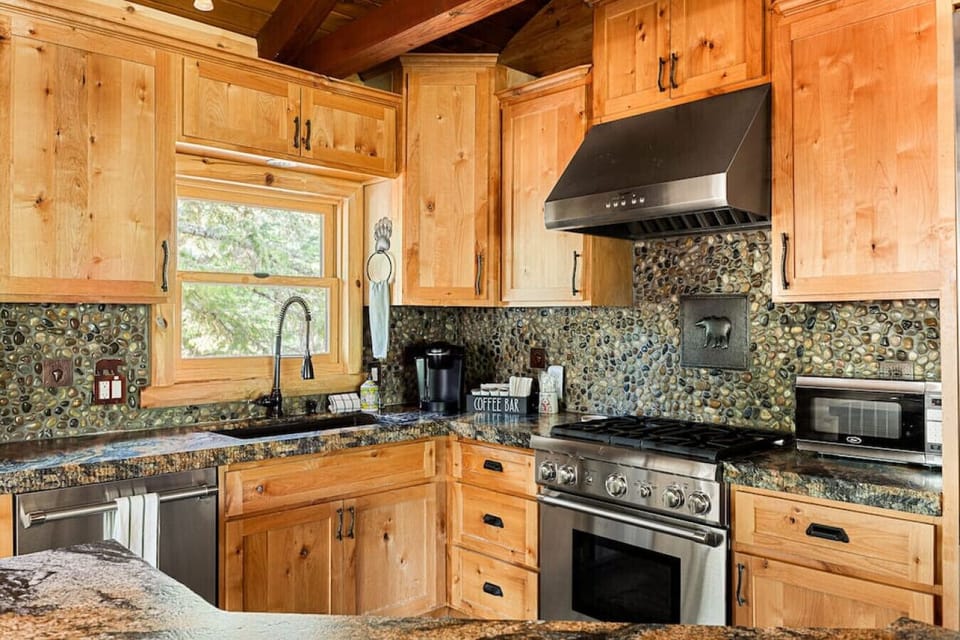 Fully equipped kitchen comes with a toaster oven and full coffee bar for your stay.