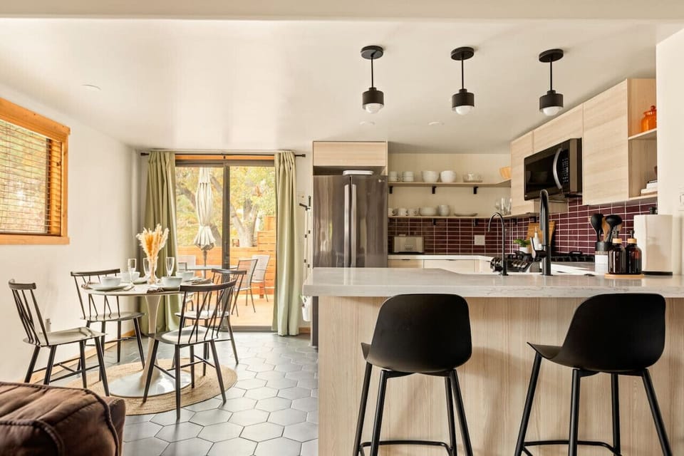 The kitchen is open to the living room so the whole group of family and friends are able to hang out together.