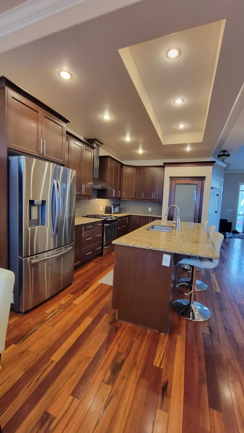 A fully equipped kitchen featuring all essential appliances, cookware, utensils