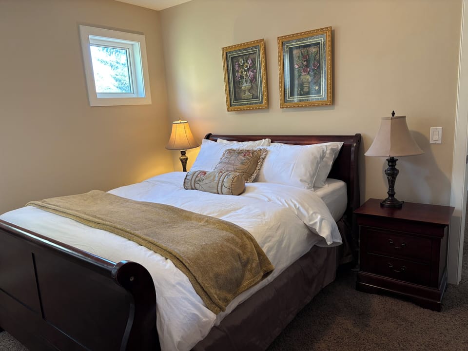 A cozy bedroom #3 with a Queen-size bed and a large window