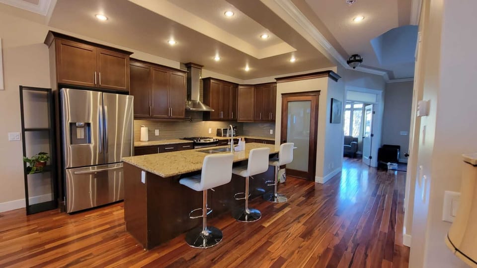 A fully equipped kitchen featuring all essential appliances, cookware, utensils