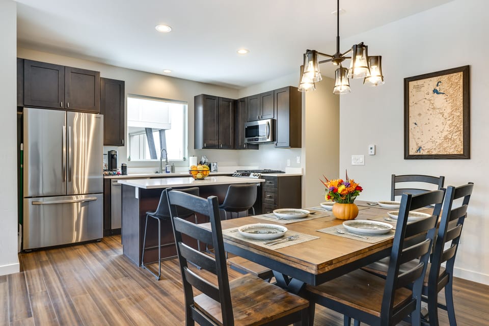 Dining Area & Kitchen | 2-Story Townhome | In-Unit Laundry | Self Check-In