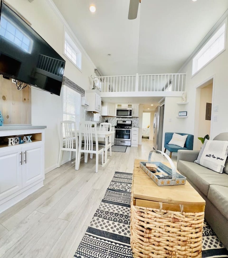 Living room, dining room, and kitchen.