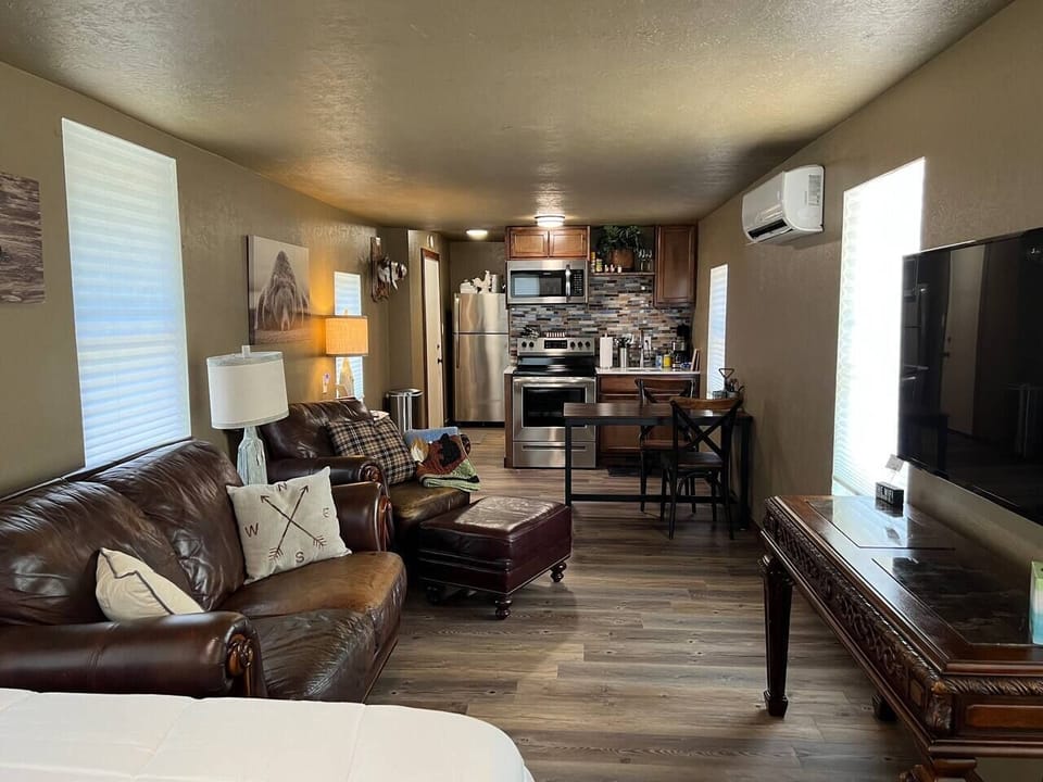 Living area w/ kitchen and dining