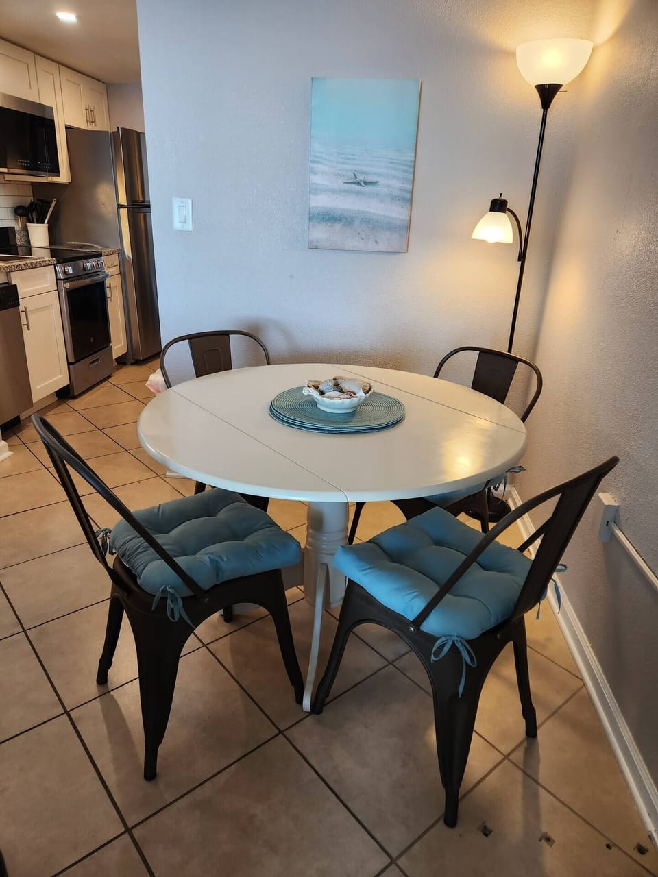 table in living room with 4 chairs