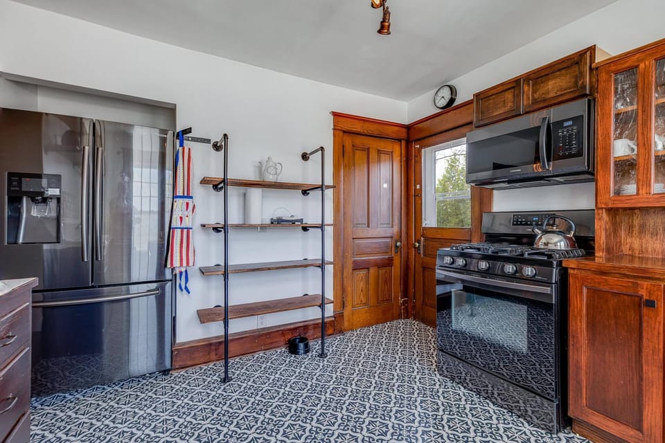 Updated refrigerator, stove and microwave.