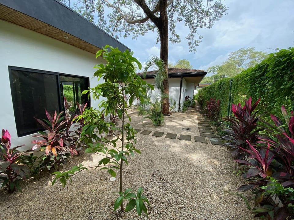 Outside casita area showing walkway from front of house