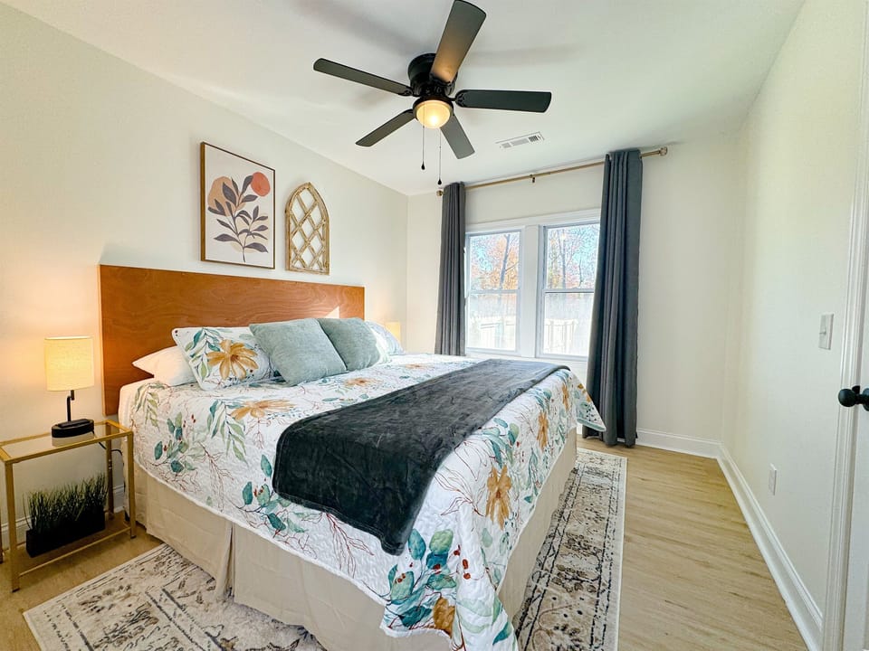 Bedroom #2 features a king sized bed with a new memory foam mattress