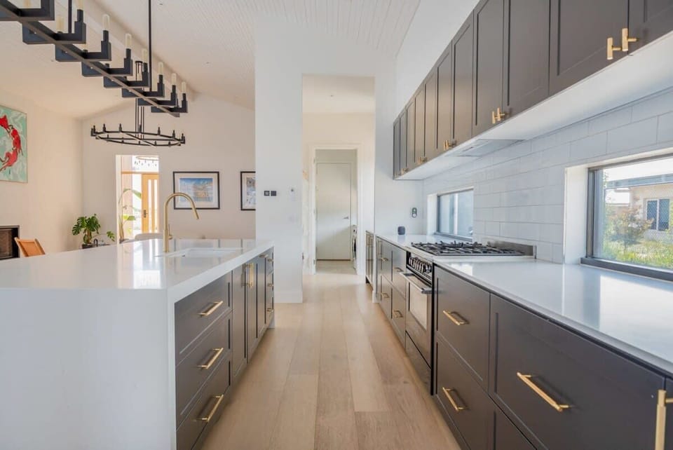 The modern, well-equipped kitchen ensures great food preparation for special occasions, all conveniently connected to the dining area.