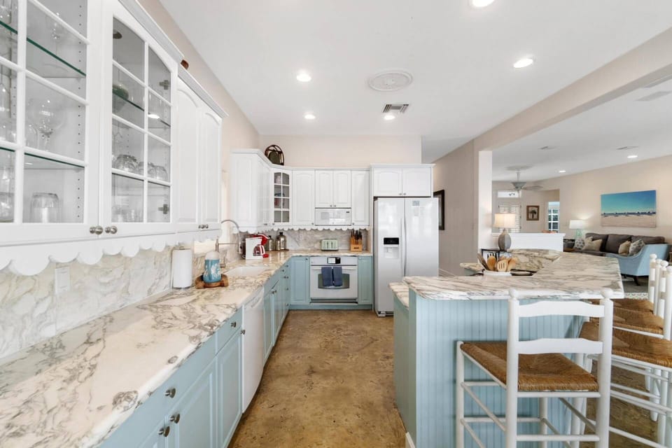 Open kitchen concept with plenty of counter space for prepping meals and hanging out.