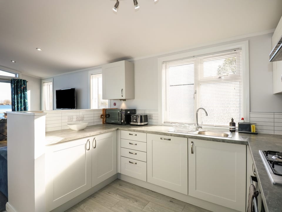 Fridge, dishwasher, electric kettle, toaster