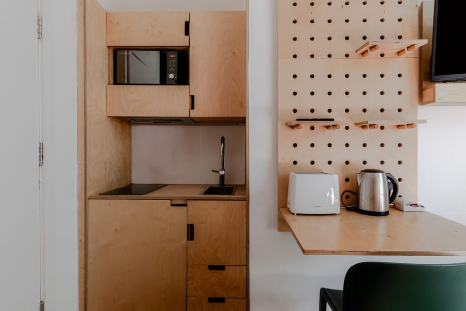 Mini-fridge, microwave, stovetop, electric kettle