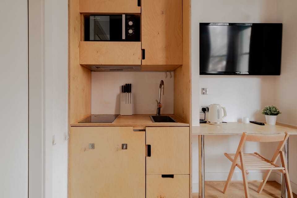 Basic Apartment, Private Bathroom (15) | Private kitchen | Mini-fridge, microwave, stovetop, electric kettle