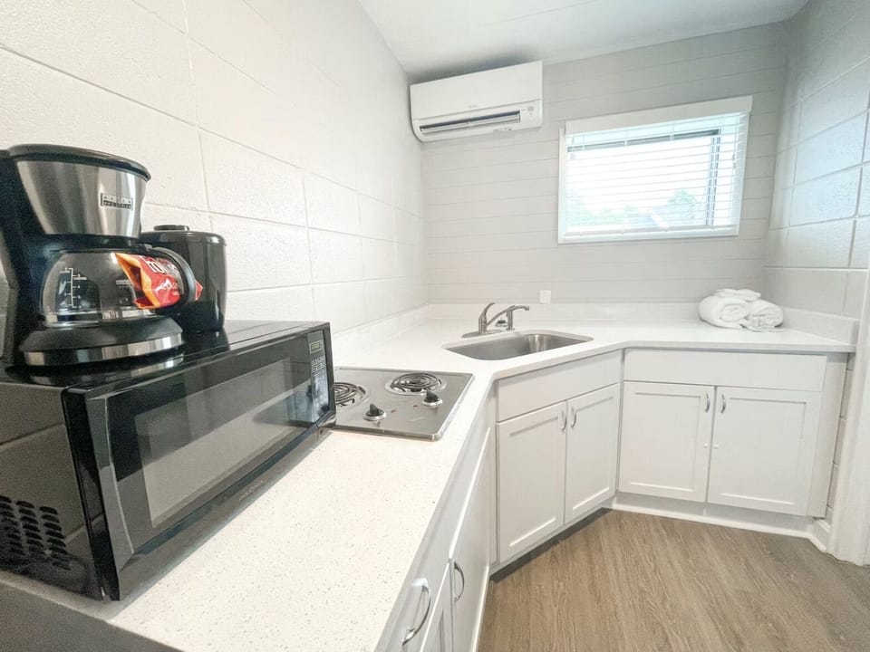 Waterfront A Standard Kitchenette | Private kitchenette | Microwave