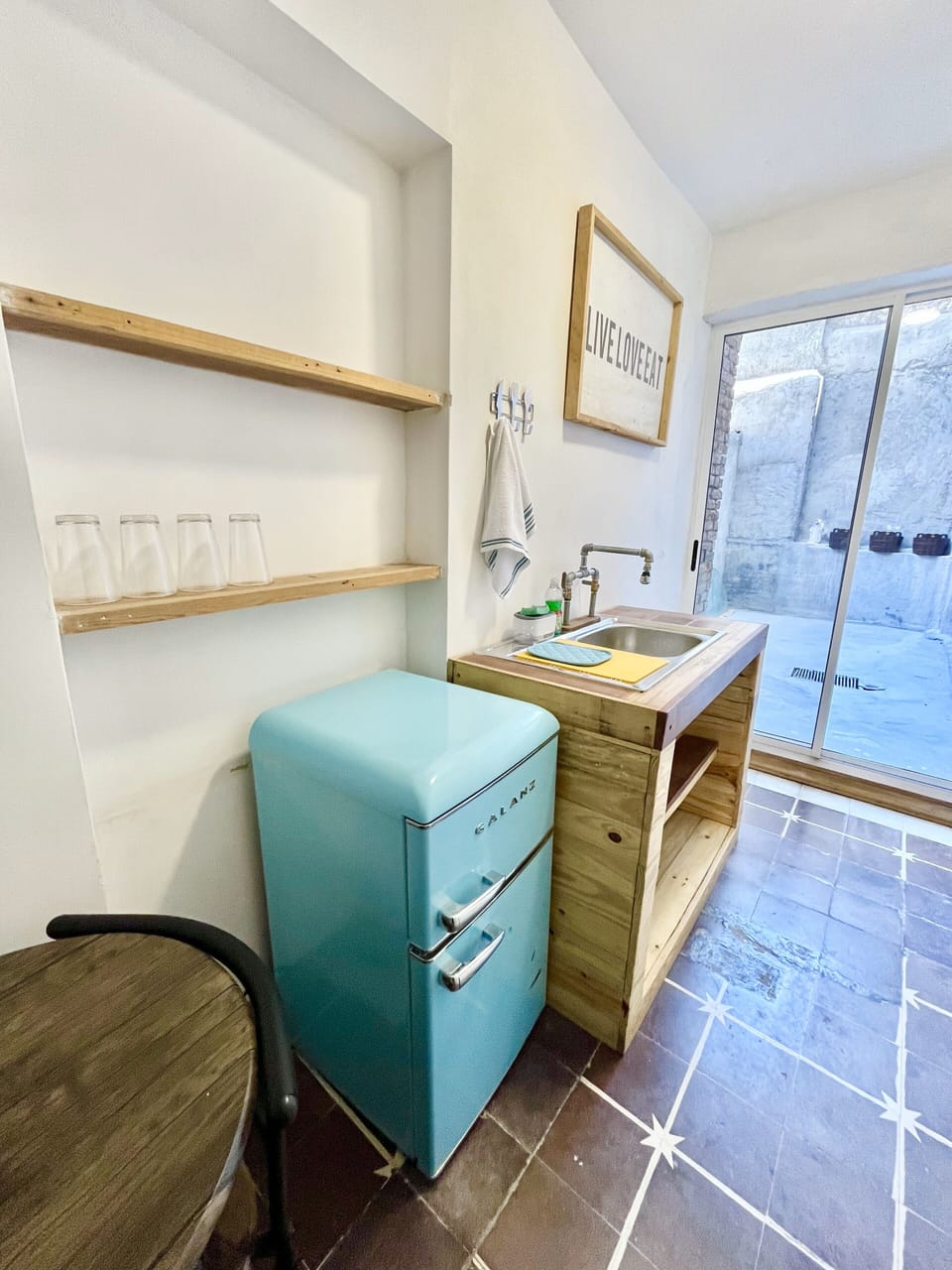 Basic Apartment | Private kitchen | Coffee/tea maker, shared microwave, dining table