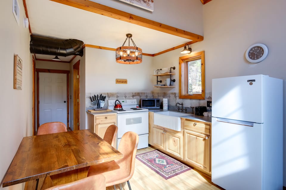 Kitchen | Dining Area | Main Level | Coffee Maker | Dishware + Flatware