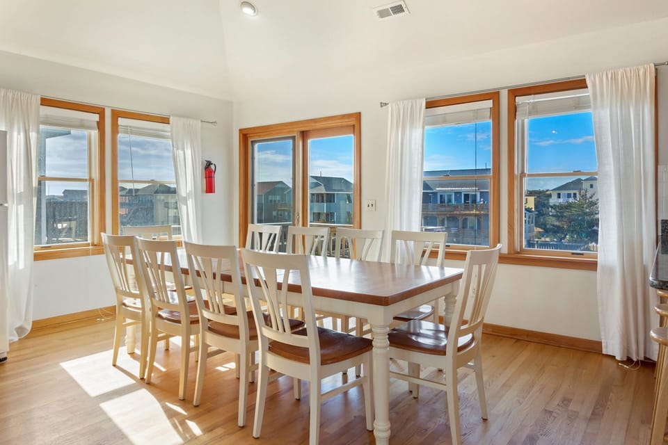 The Dining Area offers plenty of sunshine and seating for 10!