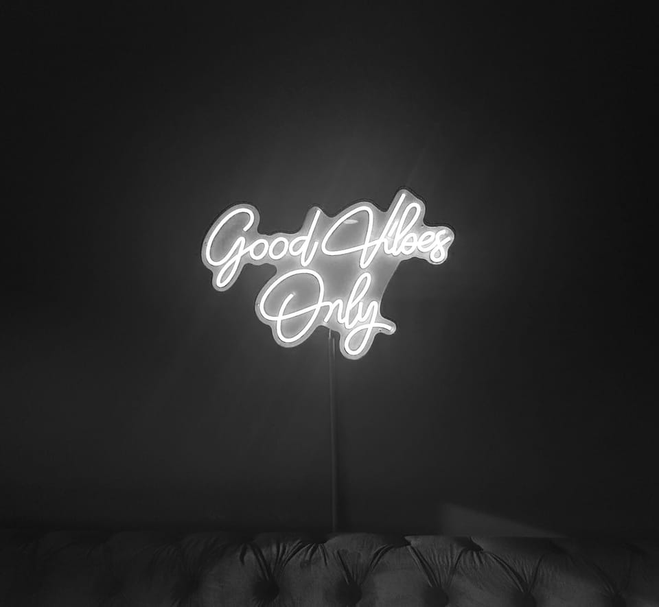 Neon Lights of the Property's name.