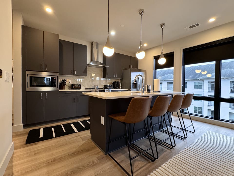 Handcrafted barstools - New appliances - Fully equipped kitchen.