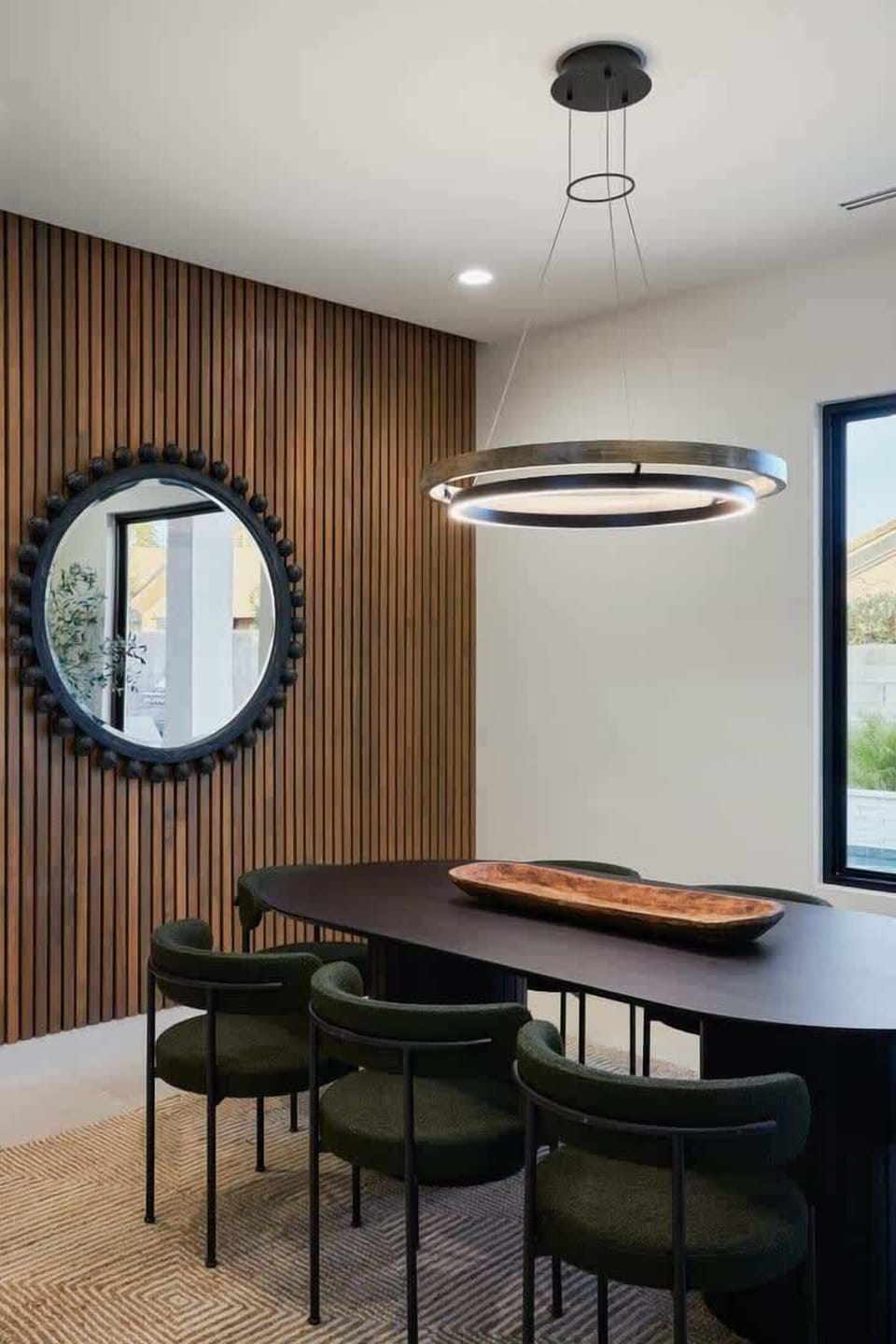 Formal dining room featuring a large table to accommodate up to 8 guests.