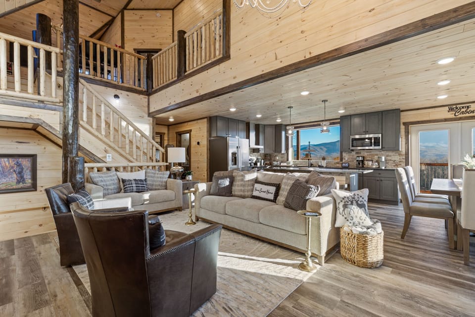 Wall-to-wall windows bring the outdoors in for family bonding moments.
