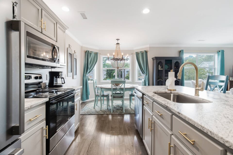 Dining table adjacent to kitchen