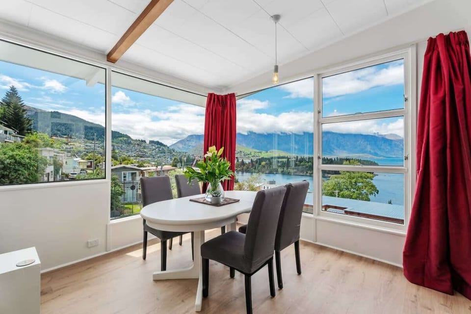 Dining Area with lake and mountain views