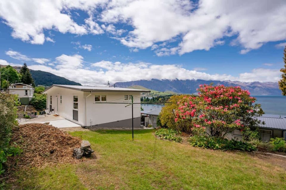 View from carport towards entrance 