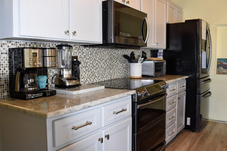 Cook up a feast in our fully-equipped kitchen with ample counter space.